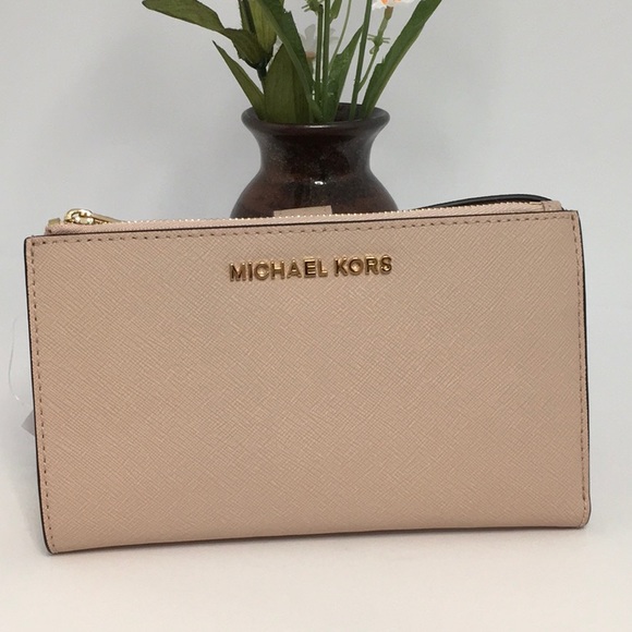 Michael Kors Handbags - Michael Kors Double Zip Wristlet in color ballet